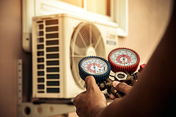 Professional Hvac technician working in Russell, KS